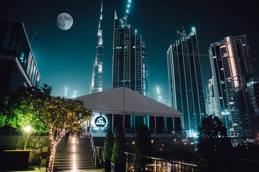 High-end marquee bar in Dubai with skyline view, luxury pop-up event venue.