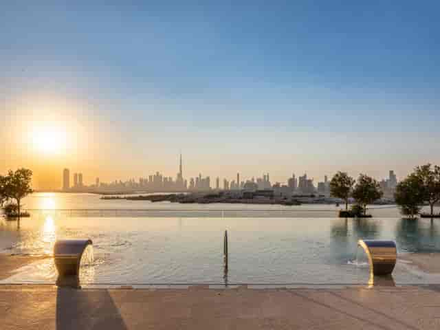Infinity pool at Address Creek Harbour, sunset skyline for luxury VIP receptions and corporate events.