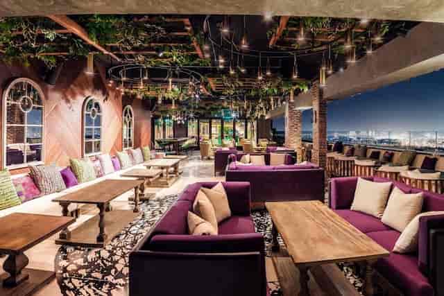 Eve Penthouse rooftop lounge with panoramic city views, ideal for luxury networking events.