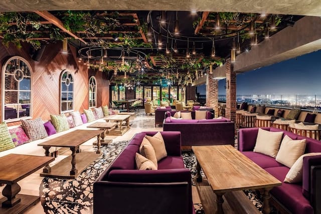 Eve Penthouse rooftop lounge with panoramic city views, ideal for luxury networking events.