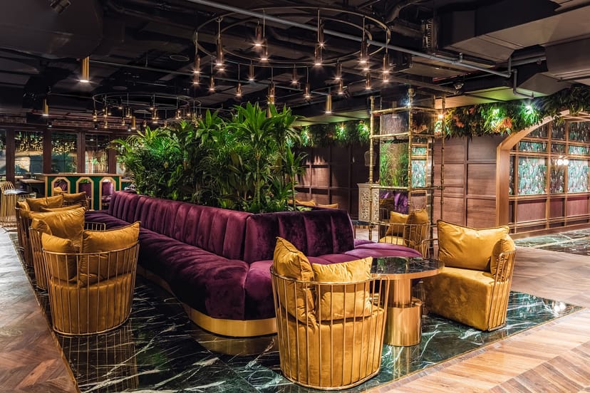 Eve Penthouse & Lounge: velvet seating in a sophisticated event space for networking and cocktails.