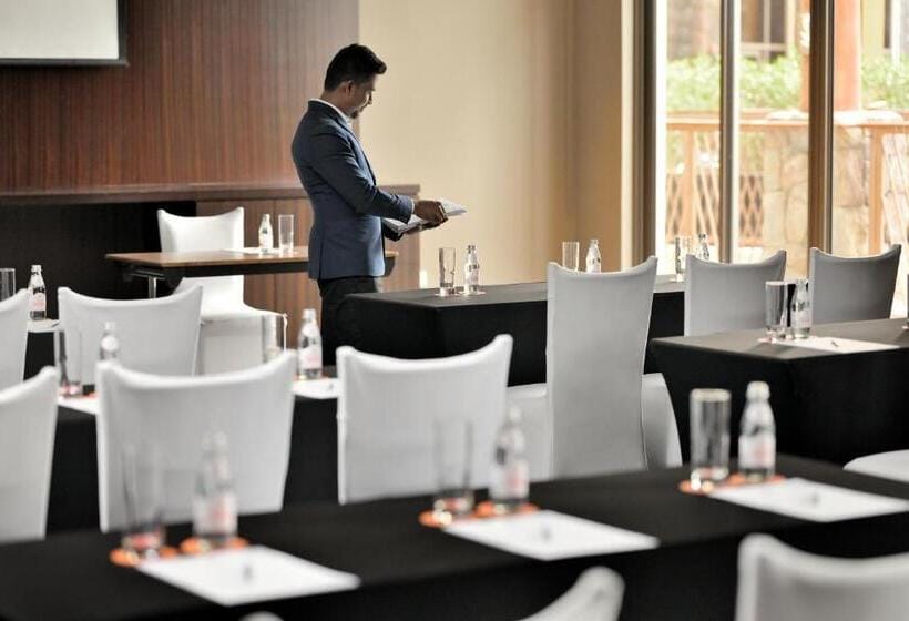 Corporate workshop seminar setup in Lapita Dubai, conference room with classroom seating.