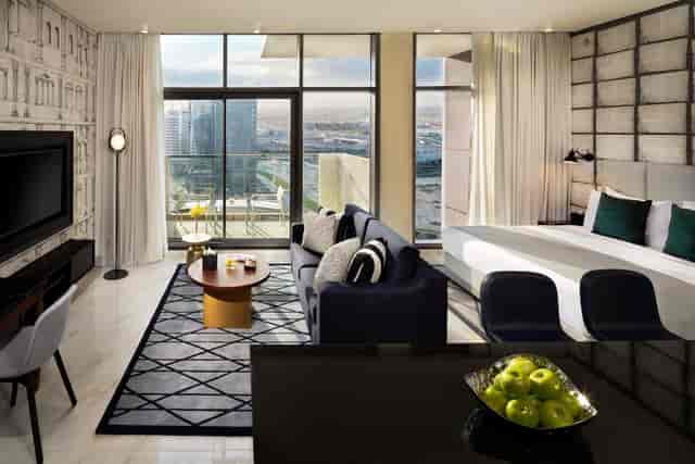 Modern hotel pre-function area, versatile suite for VIP business meetings and luxury events.