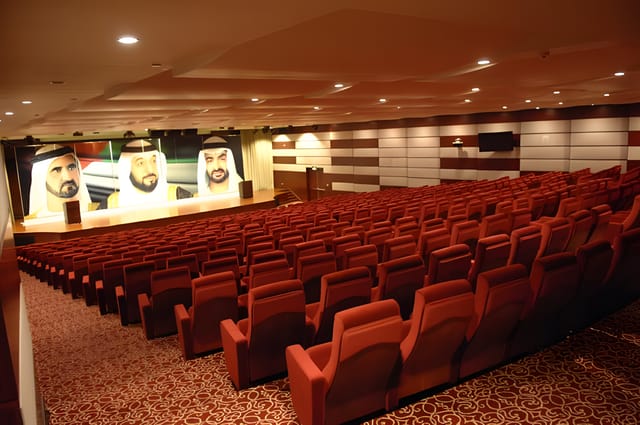 Zayed University convention hall with tiered seating for corporate conferences and presentations.