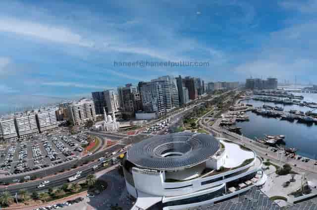 Circular Dubai Chambers auditorium venue with marina access for corporate events and luxury galas.