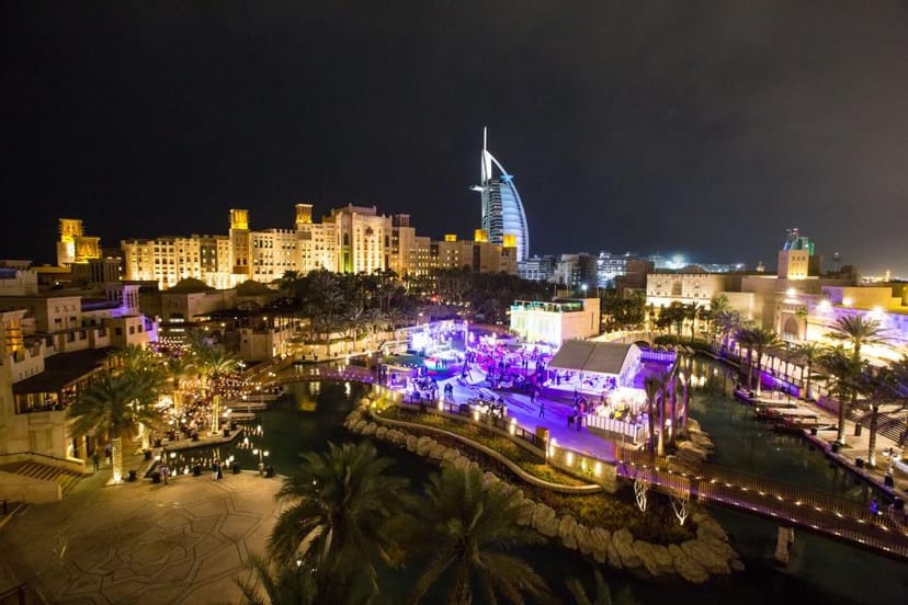 Corporate evening event at Madinat Jumeirah featuring iconic Burj Al Arab skyline views.