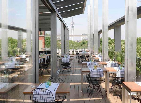 Terrazza Triennale rooftop venue with industrial architecture for corporate events and receptions.