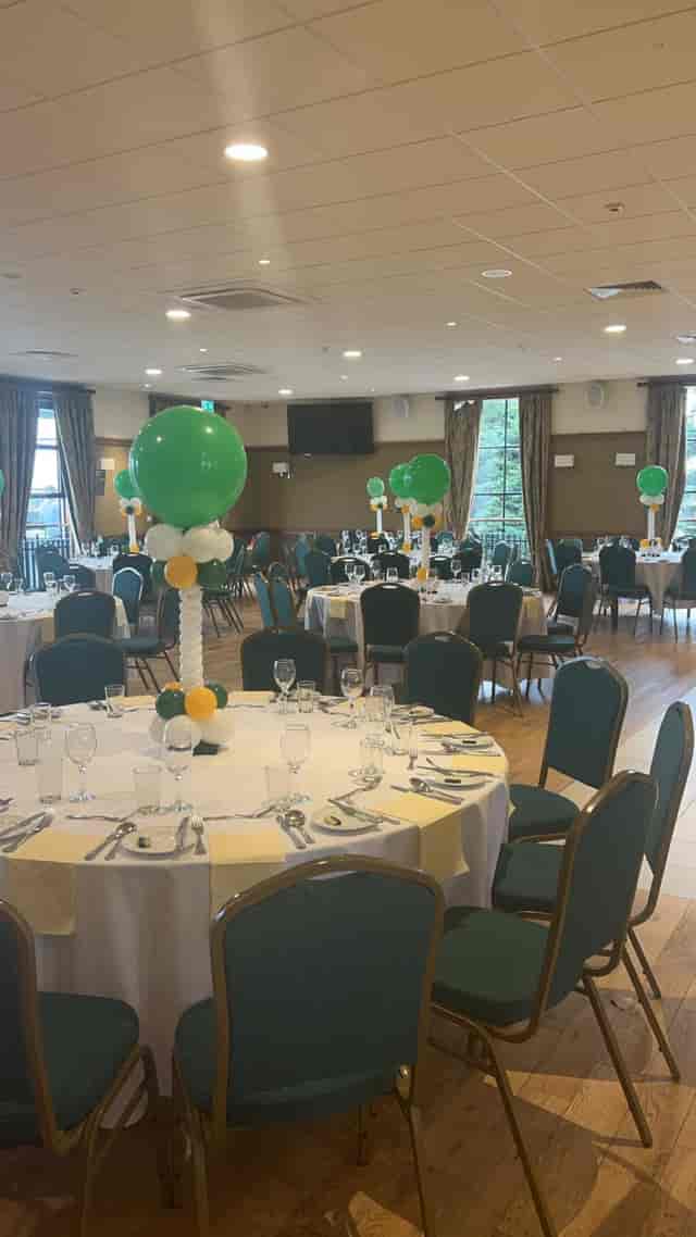 Emerald Hall banquet setup with traditional table rounds for wedding and corporate event planning.