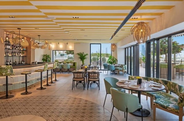 Chic coastal dining room at FIVE LUXE JBR for networking events and boutique social gatherings.