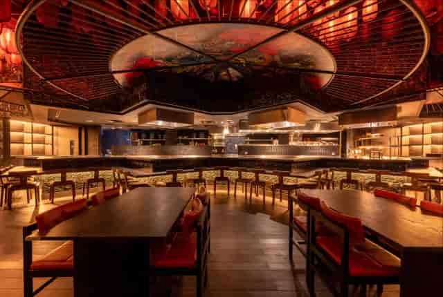 Luxury dining room at FIVE LUXE JBR with circular ceiling, perfect for VIP events and corporate dinners.