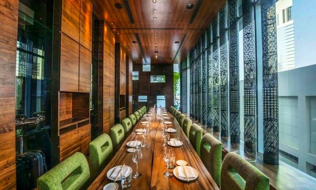 Private Dining Room 2: Boardroom-style table for executive meetings and upscale networking events.