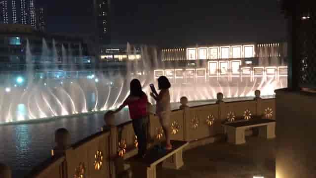 The Viewing Deck at Palace Downtown with illuminated fountains for evening events.