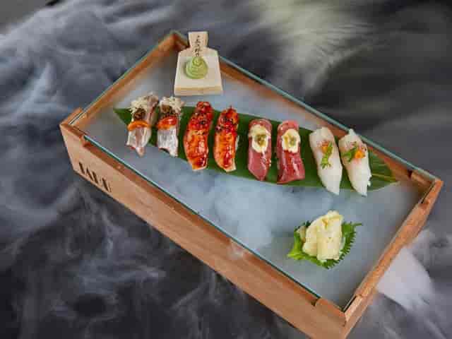 Sushi platter at TABŪ, St. Regis Dubai, ideal for upscale events and gourmet cuisine.