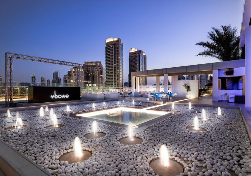 Rooftop event space at Sofitel Dubai, featuring a pool and skyline views for upscale gatherings.