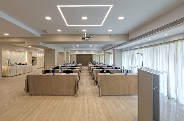 Vikos classroom at The Stanley Hotel, corporate workshop setup with catering station.