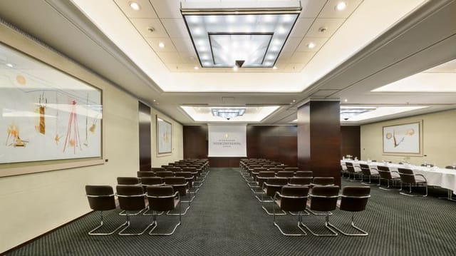 Boardroom at Athenaeum Conference Centre with integrated AV for hybrid meetings and presentations.
