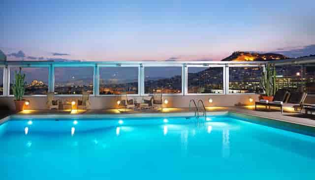 Rooftop infinity pool at Divani Caravel Vergina, ideal for networking events and corporate meetings.