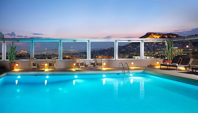 Rooftop infinity pool at Divani Caravel Vergina, ideal for networking events and corporate meetings.