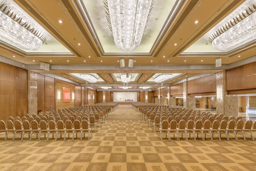 Ballroom II theater setup at Electra Palace Athens with crystal chandeliers for corporate events.
