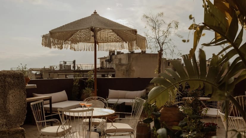 Boho rooftop networking lounge at Mona Athens for VIP corporate events and receptions.