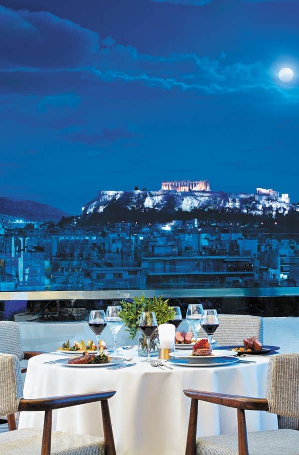 Athina rooftop venue in Wyndham Grand Athens with Acropolis backdrop for executive gala or dinner.