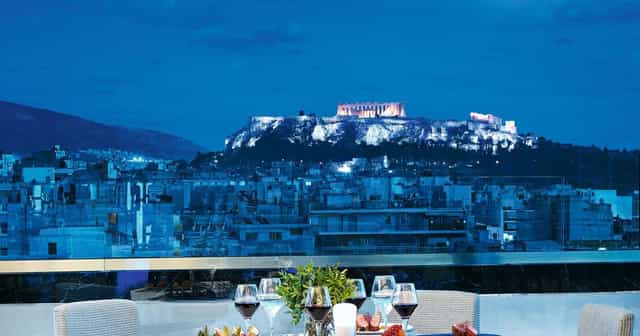 Rooftop terrace overlooking Acropolis for VIP welcome reception or incentive gala dinner.