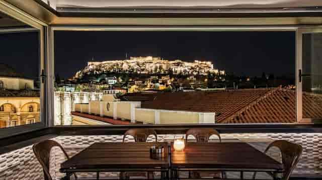 Cocktail bar with panoramic Acropolis view for VIP hospitality and executive dinners.