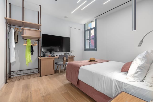 Modern Gaia accessible hotel room with workstation for business travel.