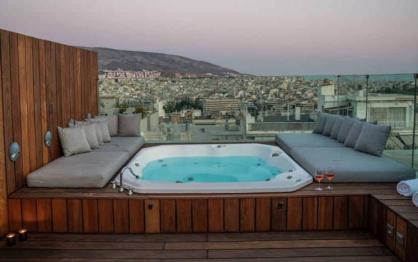 Luxury rooftop lounge for VIP receptions and corporate events with panoramic skyline views.