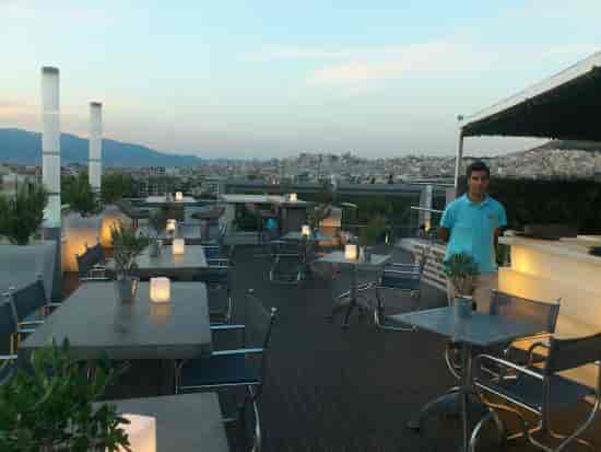 Rooftop restaurant at Radisson Blu Athens, ideal for evening cocktail reception and corporate events.