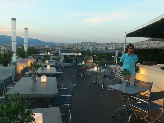 Rooftop restaurant at Radisson Blu Athens, ideal for evening cocktail reception and corporate events.