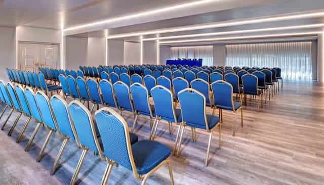 Aristotelis Conference Hall theater seating for corporate presentations and training seminars.