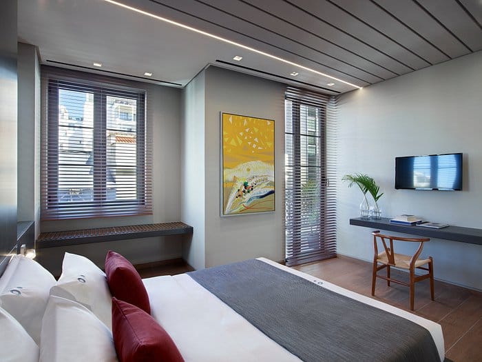 Athens Ikon executive guest room with workspace for corporate business travel.