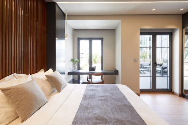 Executive suite in Athens Ikon with workspace and terrace for business travel and corporate events.