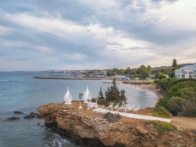 Cliffside wedding ceremony at Sea Soul with coastal backdrop for destination event photography.