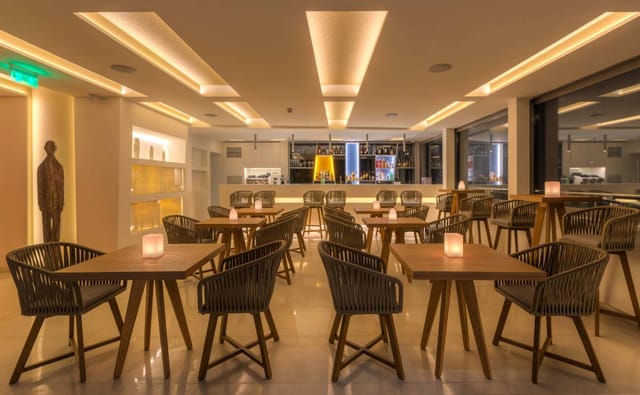 Thea Terrace Bar: Modern lounge space for professional networking and cocktail events.