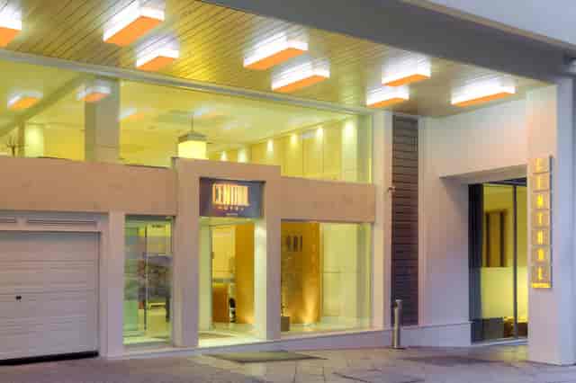 Modern hotel entrance in Plaka, Athens, ideal for event load-ins and corporate arrival logistics.