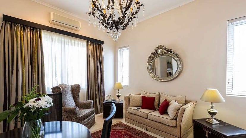Elegant meeting room with cozy seating for intimate corporate events and VIP business conferences.