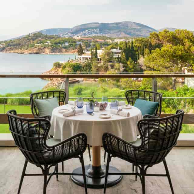Luxury waterfront incentive dinner setup at Four Seasons Astir Palace Athens.