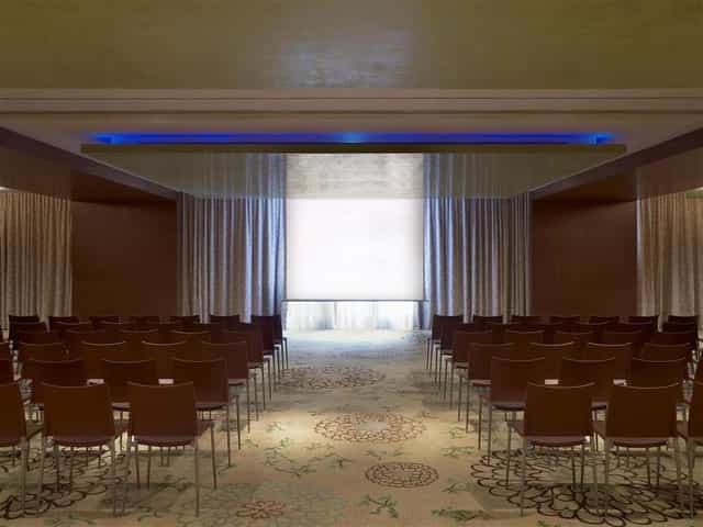 Ballroom theater setup at Four Seasons Athens for corporate presentations and professional seminars.