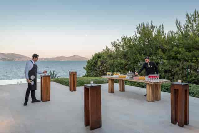 PRIVE outdoor event setup, live-edge wood accents, luxury wedding venue, waterfront gala space.
