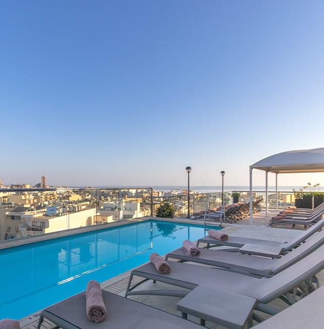 It-Terazzin pool deck rooftop venue with skyline views for upscale cocktail receptions and events.