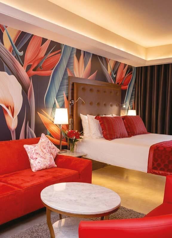 Luxury Victoria Hotel suite with tropical wall for VIP incentive travel and speaker events.