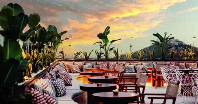 Luxury sunset cocktail bar in Deos Athens with lounge seating for upscale event venue hire.