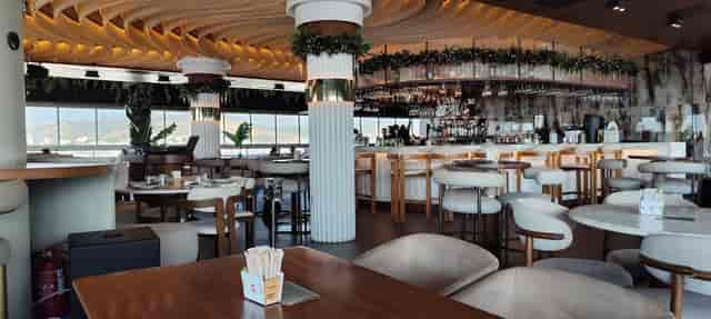 Dinner in Deos Athens: upscale cocktail venue with sophisticated architecture for VIP events.