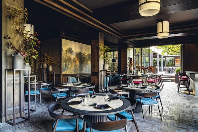 Freud Oriental: Sophisticated indoor-outdoor venue for upscale corporate dinner and networking.