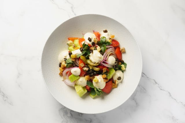 Vegetarian appetizer plate at Pasithea Rooftop Bar for elegant corporate banquets or events.