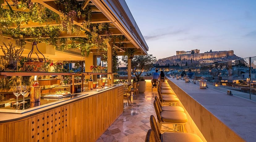 Rooftop cocktail reception at M Bar Athens with Parthenon view for corporate networking events.