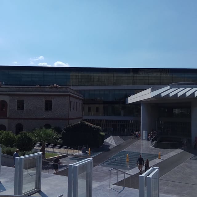 Acropolis Museum courtyard, modern architecture, ideal for site visits and outdoor receptions.