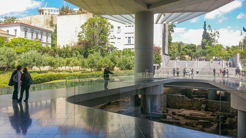 Acropolis Museum entrance courtyard: modern architectural event venue for upscale receptions.